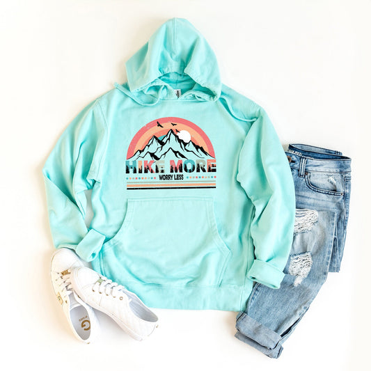 a light blue hoodie with the words hike more on it and a pair of